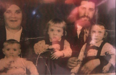 Yitzchak Brecher, son of Asher and Pesel, with his wife Frimet and their children.
