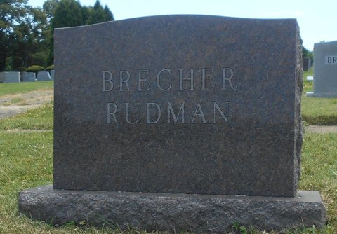 The joint family gravestone inscribed BRECHER / RUDMAN, Shaarei Tfiloh Cemetery, Baltimore, Section K: the stone of Hannah (Brecher) and Albert Rudman (a differ