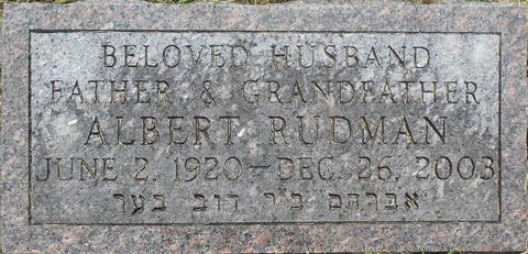 The grave plaque (gravestone) of Albert Rudman, Hannah’s husband — in Hebrew Avraham ben R’ Dov Ber — 2 Jun 1920 – 26 Dec 2003, Shaarei Tfiloh Cemetery, Baltimo